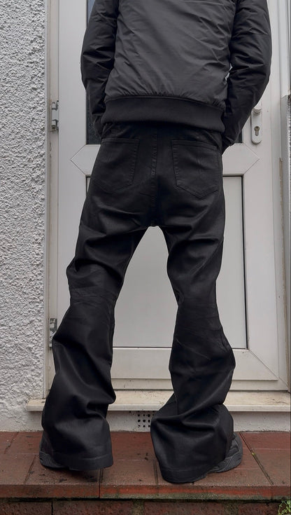 "Clawmark" Wax-coated Flared Denim