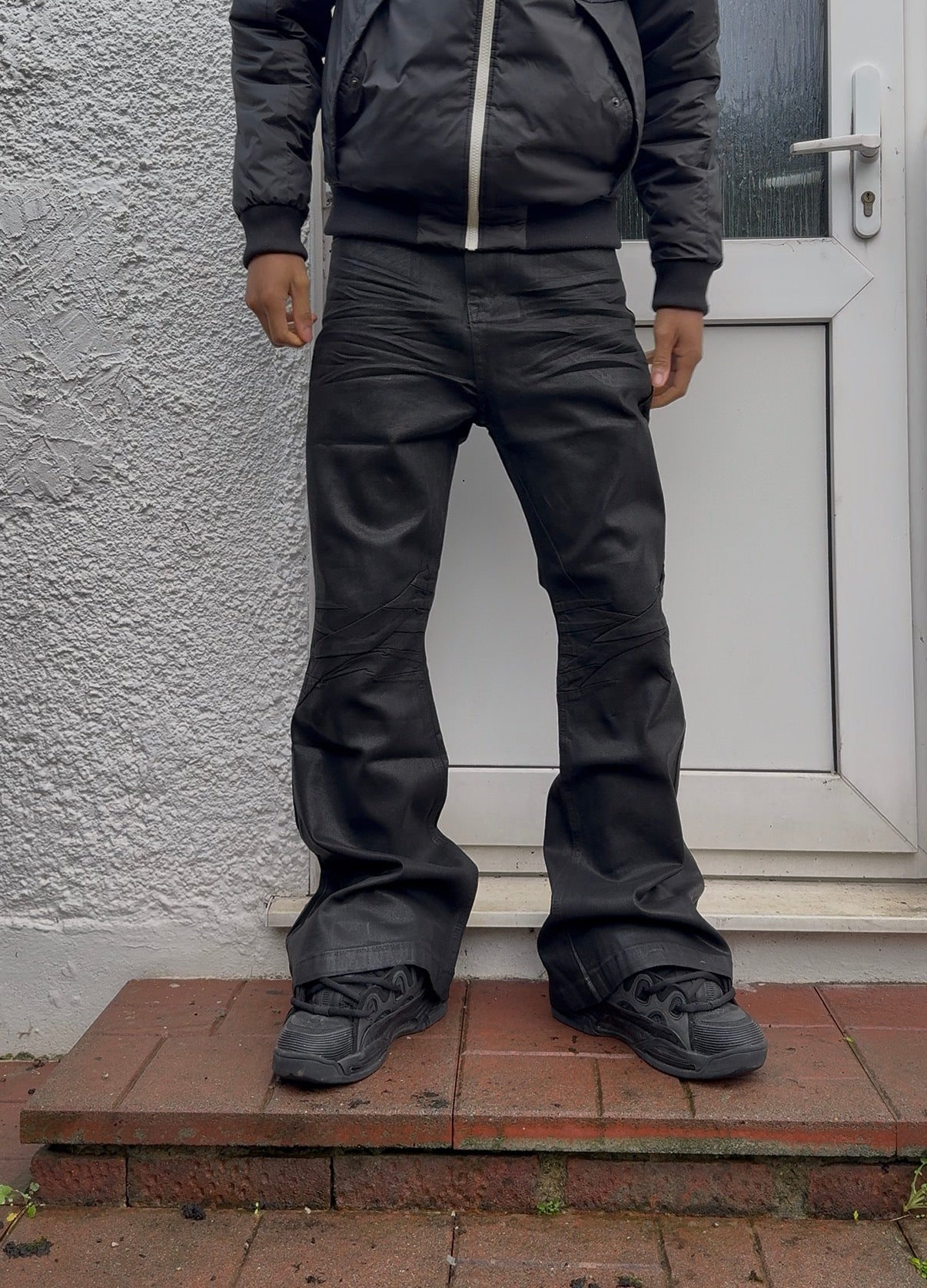 "Clawmark" Wax-coated Flared Denim